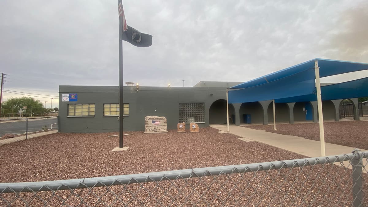 American Legion Hazelton-Butler Post 53 building at 402 E Narramore Avenue in Buckeye, Arizona, with US flag and POW/MIA flag flying out front.